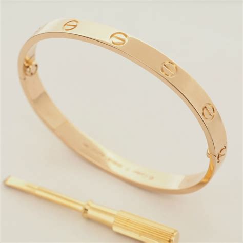 cartier 18k gold screw system.